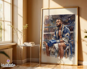 May include: A framed watercolor print depicting a boxer with a beard, wearing blue and gold boxing gloves and a matching robe, sitting on a stool in a boxing ring with a blurred crowd in the background. The artwork includes the text Lilac Wall Arts.