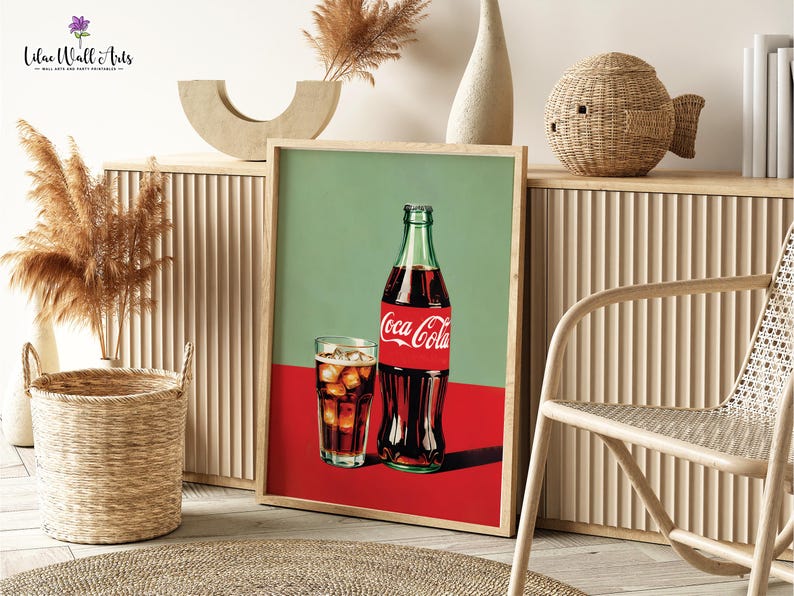 May include: A vintage-style poster featuring a glass of Coca-Cola and a bottle of Coca-Cola. The poster has a green background with a red bottom and the text "Coca-Cola" in red.
