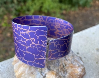 Vibrant Anodised Aluminium Bangle, Blue/Purple background with orange  crackling