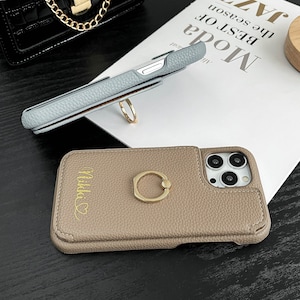 a phone case with a ring on it