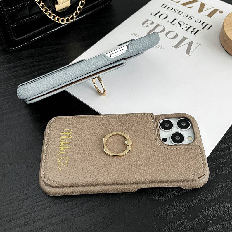 a phone case with a ring on it