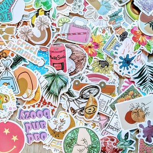May include: A collection of colorful stickers featuring various designs, including a tropical palm tree, a bicycle, a coconut, a sloth, a sun, a soda can, a flower, and a phrase that says "cruel summer".