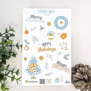 Jolie feuille d'autocollants bleu et orange joyeux Noël pour les vacances d'hiver pour un agenda de décoration, un album, un journal, un cadeau