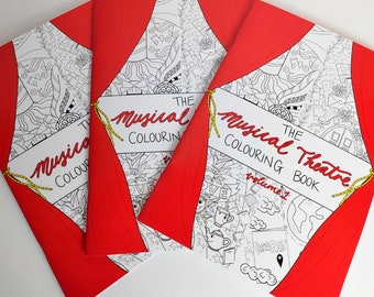 May include: Three coloring books with red covers and white illustrations. The covers feature the text "The Musical Theatre Colouring Book, Volume 1".