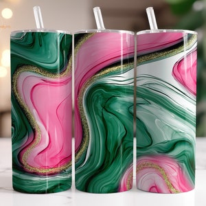 May include: Three stainless steel tumblers with lids and straws. The tumblers feature a pink and green abstract marble design with gold glitter accents.