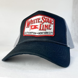 May include: Black and grey trucker hat with a red and white embroidered patch that says "White Star Line Southampton * New York City".