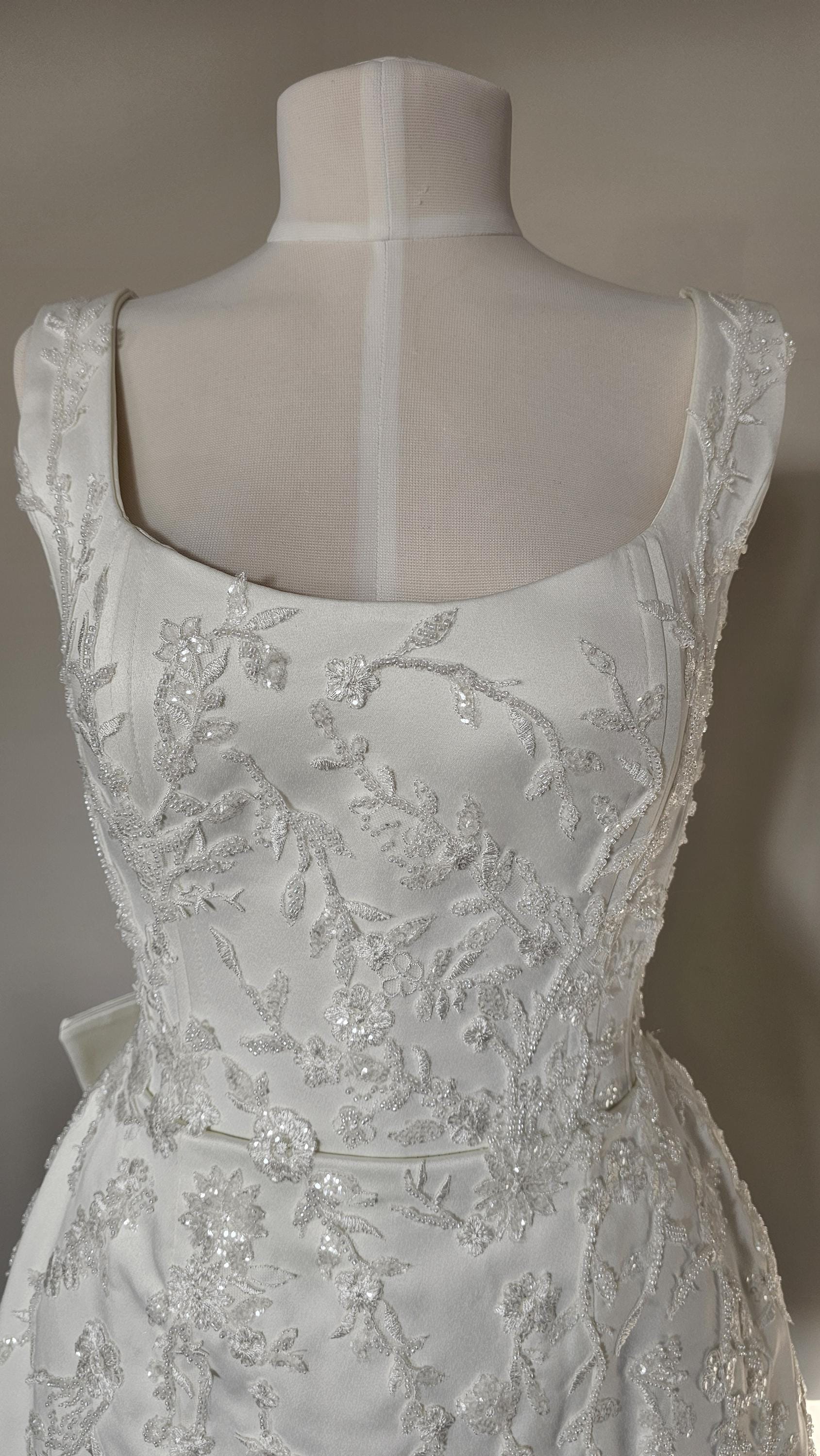 Hand-embellished mini dress with bows