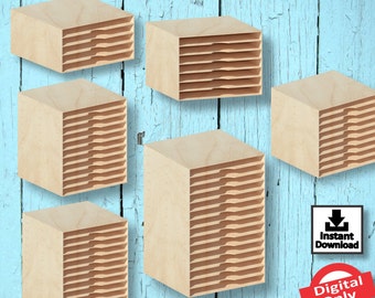 May include: Five wooden boxes with a decorative pattern of stacked, wavy lines. The boxes are different sizes and are arranged on a blue wooden background. The text "Thickness 3mm" is at the top of the image.