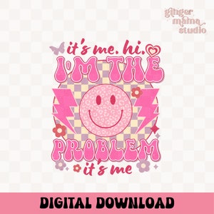 May include: Pink and white graphic with the text "it's me. hi. I'M THE PROBLEM • it's me" in a retro font. A pink smiley face with leopard print is in the center of the graphic. The graphic is on a checkered background with pink flowers and lightning bolts.