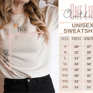 May include: A beige unisex sweatshirt with size chart. The chart shows chest measurements from 51 cm to 86 cm, lengths from 69 cm to 86 cm, and sleeve lengths from 85 cm to 103 cm. The text "One Life Clothing" is at the top.