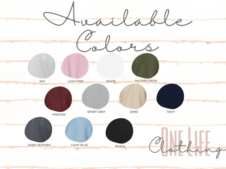 May include: A graphic showing a selection of available colors for clothing items. Colors include ash, light pink, white, military green, sport grey, sand, navy, maroon, dark heather, light blue, and black. The text "Available Colors" is at the top.
