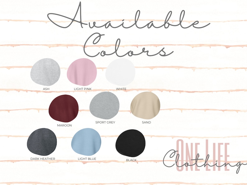 May include: A display of available sweatshirt colours: ash, light pink, white, maroon, sport grey, sand, dark heather, light blue, and black. The words "Available Colors" are at the top, with "ONE LIFE CLOTHING" at the bottom.