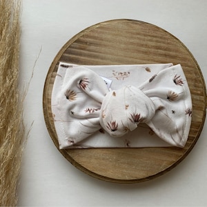 Noeuds de serre-tête pour bébé