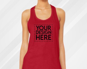 May include: A red tank top with a racerback design. The front of the tank top features the text "YOUR DESIGN HERE" inside a dashed square. The tank top is made of a soft material.