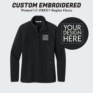 May include: Black fleece jacket with a zipper closure and two pockets. The jacket has a space for embroidery on the left chest with the text "YOUR DESIGN HERE".