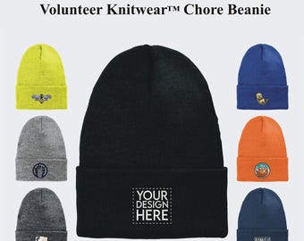 May include: A collection of eight black, yellow, blue, gray, and orange knit beanies with various embroidered designs. The beanies are all the same style and have a fold-over cuff. The center beanie is black and has a white square with the text "YOUR DESIGN HERE".