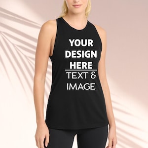 May include: Black tank top with the text "YOUR DESIGN HERE TEXT & IMAGE" in white. The sleeveless top has a rounded neckline and is made of a soft material. The tank top is suitable for workouts or casual wear.