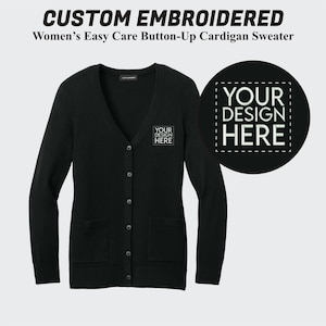 May include: Black cardigan sweater with a v-neck and button closure. The sweater has two pockets and the text "YOUR DESIGN HERE" is embroidered on the left chest.