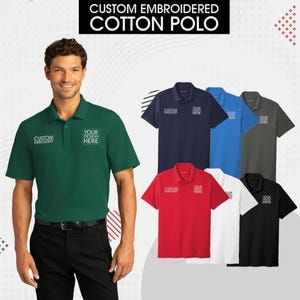May include: A selection of custom embroidered cotton polo shirts in various colors, including green, navy blue, royal blue, gray, red, white, and black. Each shirt features the text "CUSTOM EMBROIDERY" and "YOUR DESIGN HERE" on the front.