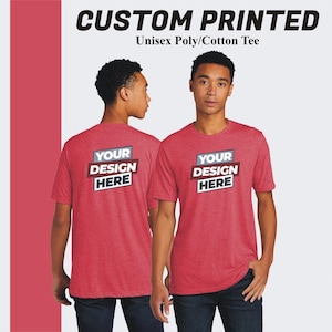 May include: Two models wearing red heather t-shirts with the text "YOUR DESIGN HERE" printed on the front and back. The shirts are a unisex poly/cotton blend.