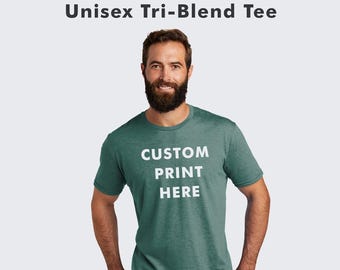 May include: A green tri-blend t-shirt with the text "CUSTOM PRINT HERE" in white.