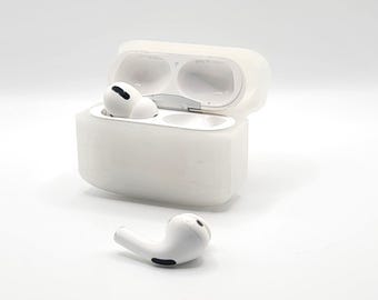May include: White wireless earbuds in a white charging case. The case is open and the earbuds are partially inside.