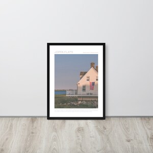 Joppa Flats, Newburyport framed travel poster propped up against wall