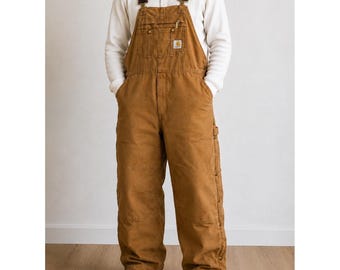Mono de trabajo Carhartt para hombre de los años 90, talla 44x27, color marrón, con parte delantera tipo chaparrera, forro de nailon y acolchado rojo grueso.