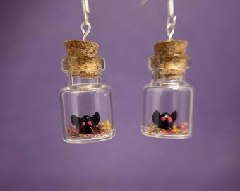 Tiny Mothman Bottle Earrings with Glowing Eyes