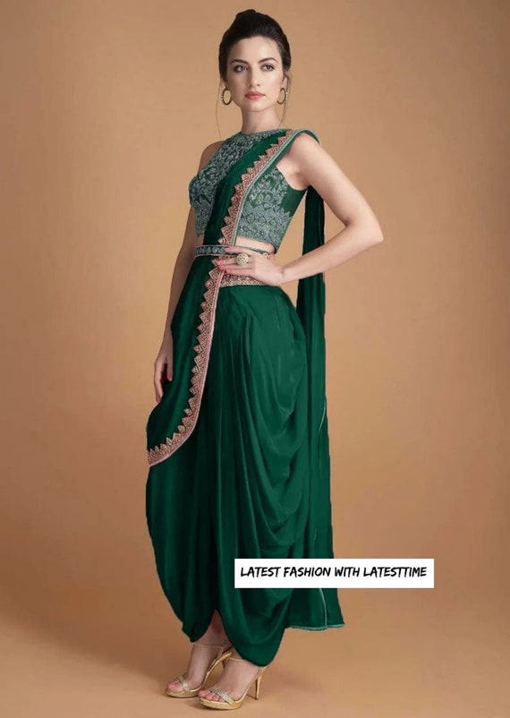 Green one shoulder satin gown by Designer