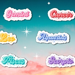 May include: Six colorful retro-style zodiac signs with glitter accents. The signs are: Gemini, Cancer, Leo, Aquarius, Pisces, and Scorpio.