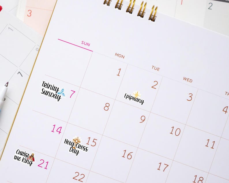 A collection of Christian holiday planner sticker sheets for 2026. Calendar picture with stickers : Epiphany, Trinity Sunday, Holy Cross Day, Christ The King shown on calendar days.