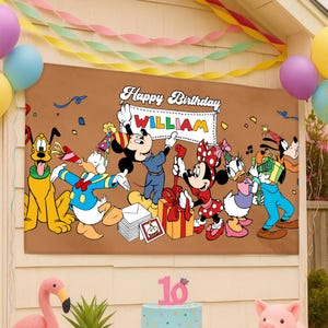 May include: A brown birthday banner featuring Mickey Mouse, Minnie Mouse, Donald Duck, Daisy Duck, Goofy, and Pluto. The banner reads "Happy Birthday WILLIAM" in white script. Colorful balloons and streamers decorate the background.