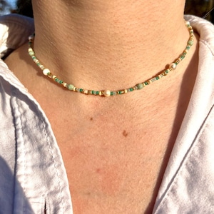 Stainless steel pearl necklace with freshwater pearls and green pearls