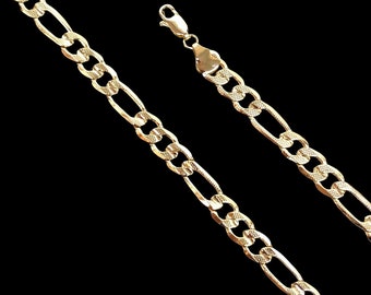May include: A gold chain necklace with a classic figaro design. The chain is made of solid gold and has a polished finish.