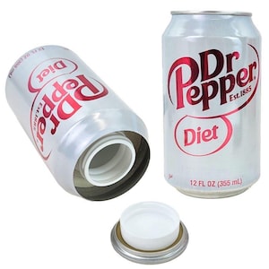 May include: A silver Diet Dr. Pepper can with red lettering and a white interior. The can is open, revealing a hidden compartment. The can is labeled "12 FL OZ (355 mL)" and "Est.1885".