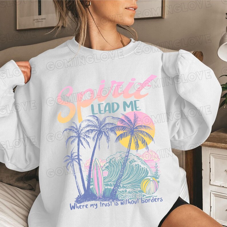 May include: White sweatshirt with a colorful graphic design featuring palm trees, waves, and the text "Spirit Lead Me Where My Trust Is Without Borders".