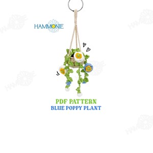 May include: PDF pattern for crocheting a blue poppy plant hanging in a pot. The plant has green leaves and blue and yellow flowers. The pattern is called "Blue Poppy Plant".