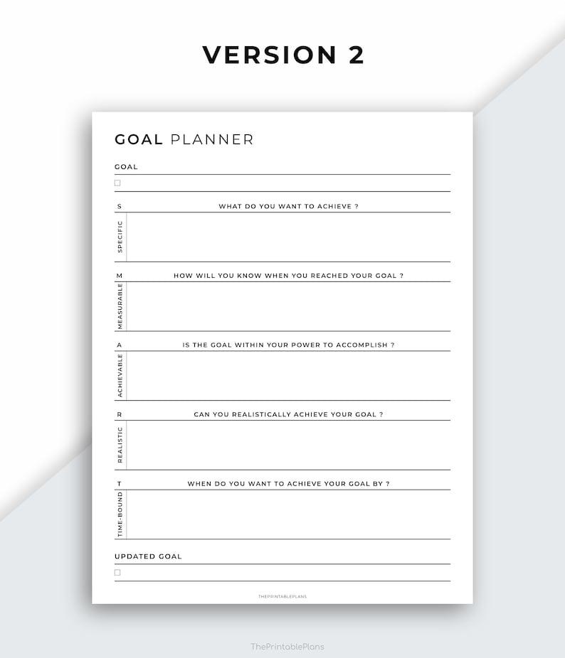 Puede incluir: Un planificador de objetivos imprimible en blanco y negro con el texto "VERSION 2" y "GOAL PLANNER". El planificador incluye una lista de verificaci&oacute;n para establecer objetivos SMART: Espec&iacute;ficos, Medibles, Alcanzables, Realistas y Con plazos.