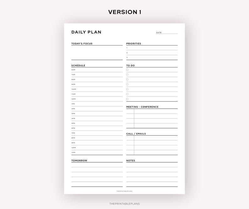 May include: A black and white daily planner with sections for today's focus, priorities, schedule, to do, meeting, call/emails, tomorrow, and notes. The planner has a simple design with a black header and lines for writing.