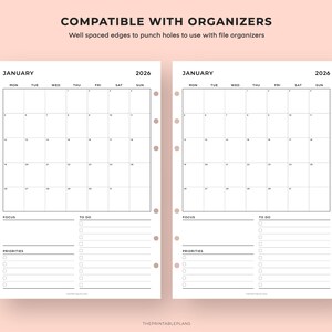 May include: Two-page spread of undated 2026 planner pages with a light pink background. Each page features a January calendar, a section for focus, to-do lists, and priorities. The text "COMPATIBLE WITH ORGANIZERS" is at the top.