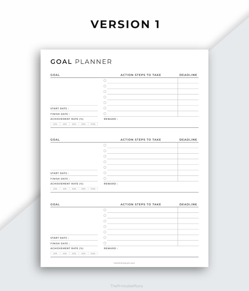 May include: A white goal planner with the text "GOAL PLANNER" at the top. The planner includes sections for goals, action steps, deadlines, start and finish dates, achievement rates, and rewards. The text "VERSION 1" is at the top.