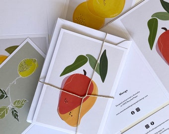 Juego de 4 tarjetas con ilustraciones de frutas: mango, limón, manzana y naranja.