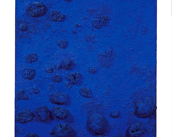 May include: A blue abstract painting with a textured surface. The painting is made up of a series of raised circles and ovals, creating a three-dimensional effect. The painting is titled "Relief éponge bleu (RE 17), 1960" and is by Yves Klein.