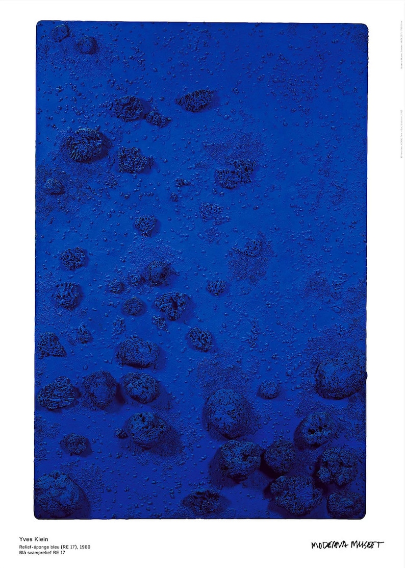 May include: A blue abstract painting with a textured surface. The painting is made up of a series of raised circles and ovals, creating a three-dimensional effect. The painting is titled "Relief &eacute;ponge bleu (RE 17), 1960" and is by Yves Klein.