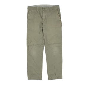 May include: Olive green chino trousers featuring a standard waistband with a single button fastening, a zip fly, two side slant pockets, and two back welt pockets. The trousers have a straight-leg cut and a clean, simple design throughout.