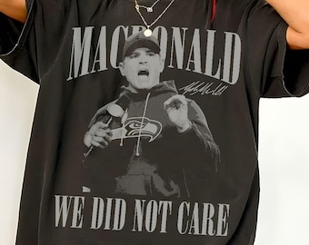Koszulka sportowa Mike'a Macdonalda "We Did Not Care" z lat 90., koszulka piłkarska Seattle, koszulka meczowa Mike'a Macdonalda