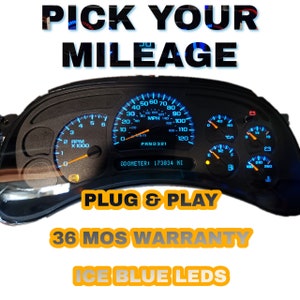May include: A black vehicle dashboard with blue illuminated gauges. The speedometer reads in MPH and km/h. The odometer shows 173834 miles. Text on the image reads "PICK YOUR MILEAGE", "PLUG & PLAY", "36 MOS WARRANTY", and "ICE BLUE LEDS".