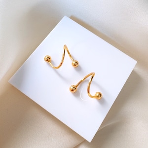 Gold spiral earrings for helix and earlobe