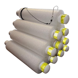 May include: A stack of white foam cylinders with yellow reflective tape on the ends. Each cylinder has a black strap and a silver hook attached.